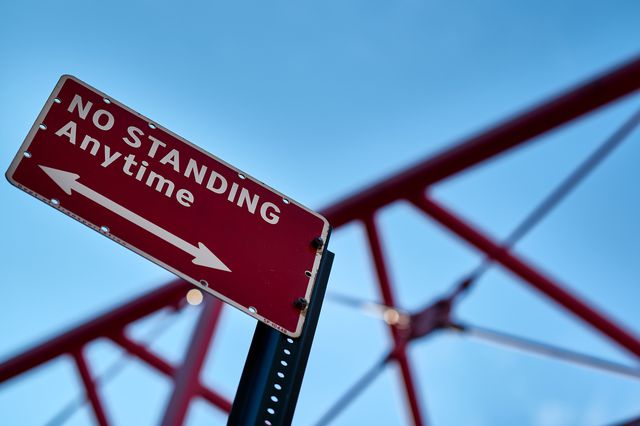 A photo of a "No Standing" sign